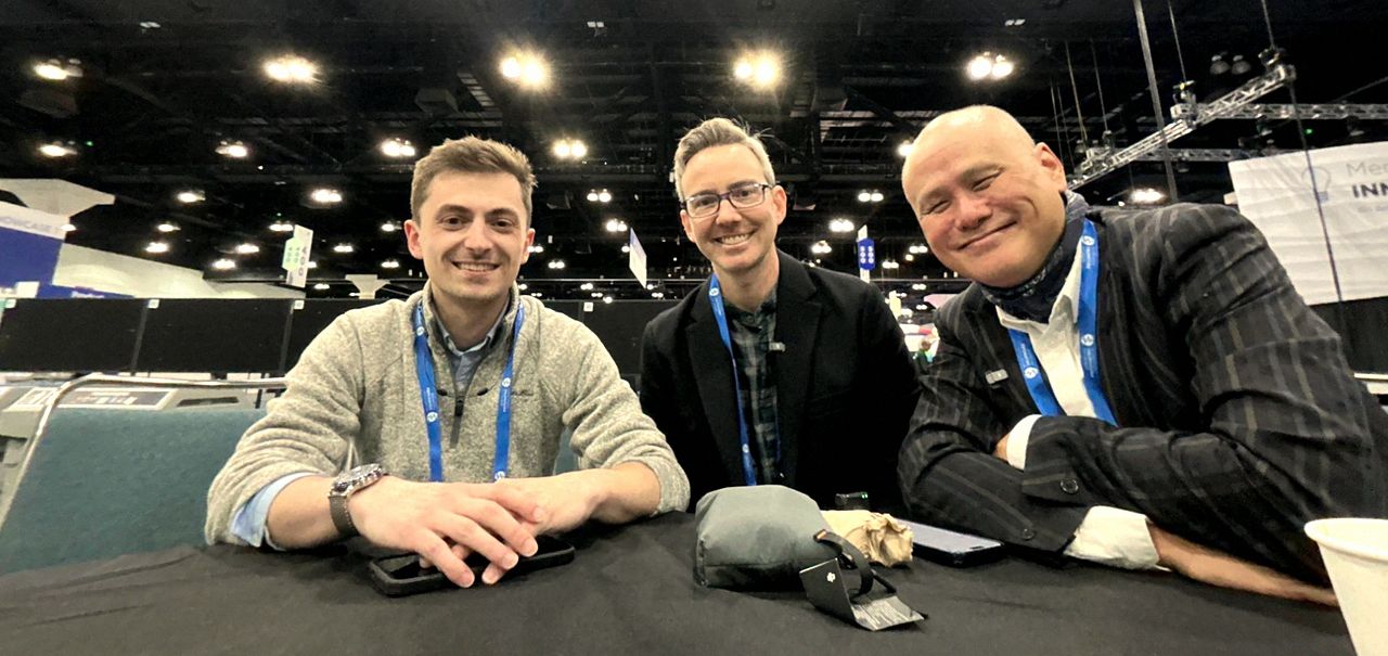 Ryan Gruzen, Harold Lee, and Devin Pellegrino together at a professional conference.